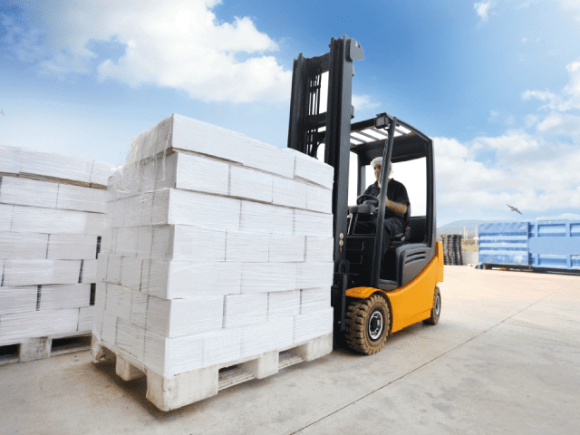 Fork lift moving crates